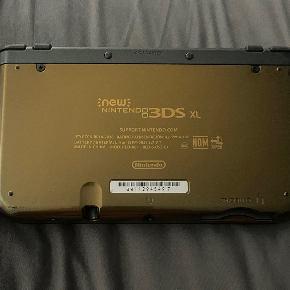 Nintendo 3DS XL in Gold and Black